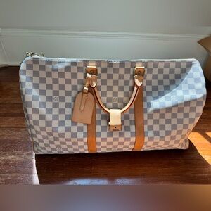 LV Keepall cloth travel bag, in good condition. Open to any offers!